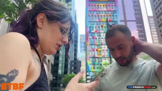 Purple-haired woman teases bearded man outdoors adult sex scene